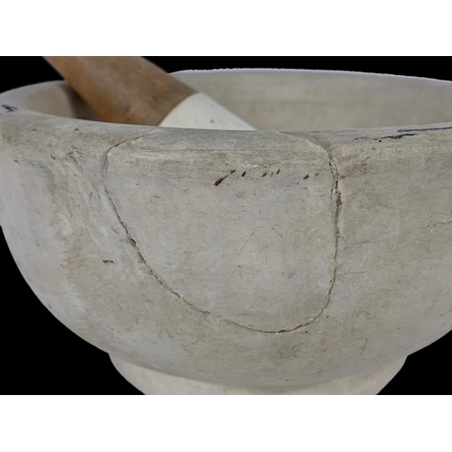12 - A large mortar and pestle. 21 x 21 x 11cm.